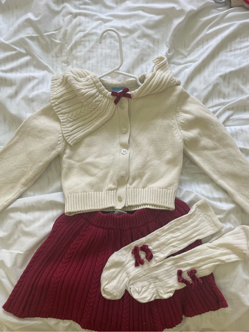Draper James Cream Cropped Cardigan with Ruffled Collar and Red Bow Accent